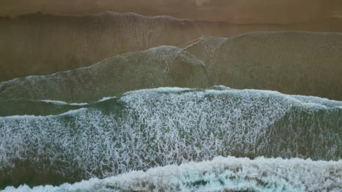 Sea Waves Breaking on Sand Beach