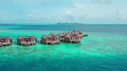 Overwater Villas in Blue Tropical Lagoon Bora Bora French Polynesia South Pacific