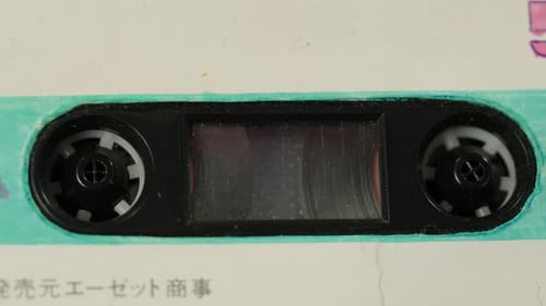 Vintage Audio Cassette Tape with Signs of Wear Used for Music Playback and Recording