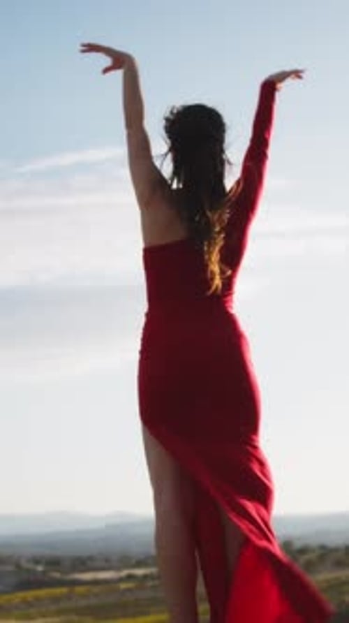 Silhouette Of A Dancing Woman In Red Dress On The Calabrian Hill