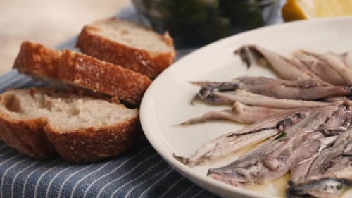 Fresh Sea Sardines and Anchovy Fish and Mullus On Display On Ice On Market Store Shop Seafood Fish