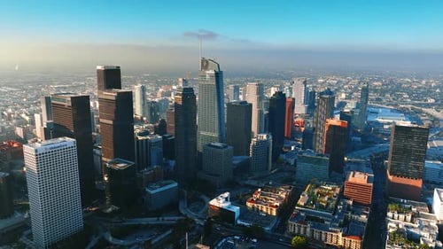 Approaching the tops of skyscrapers in Los Angeles downtown in the morning.