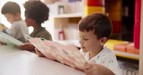 School, students and reading book with education, kids and youth with learning, relax and fantasy