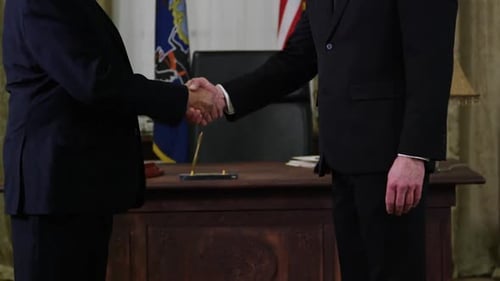 Money in Politics - handshake in the oval office HD
