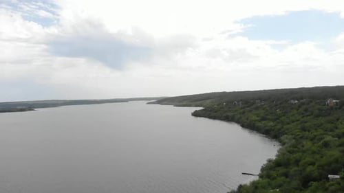 The Dnipro river aerial view drone flying over the ukrainian vilage