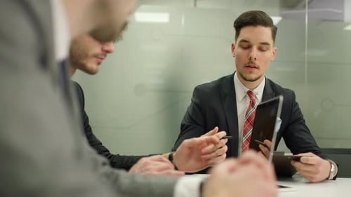 Business team engaged in a serious corporate meeting