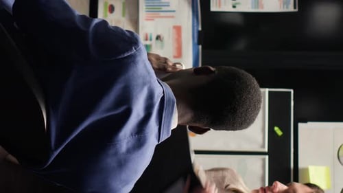 Late Night Teamwork in a Bright Office