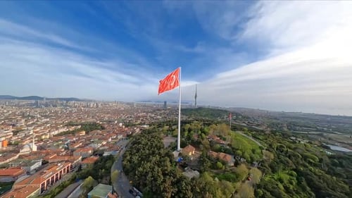 Aerial View of City with Waving Flag