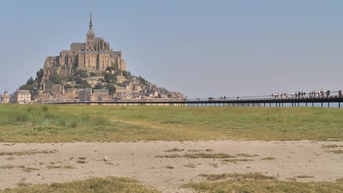 View of the bridge to the medieval abbey of Mont Saint Michel in France