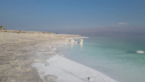 Low aerial video above the salt layers in the Dead Sea Israel