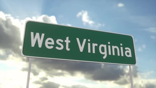 Welcome to West Virginia. West Virginia road sign on a blue sky