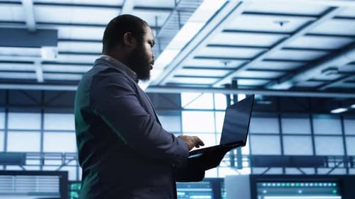 Technician in Data Center Running System Diagnostic Tests