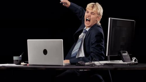 Frustrated Employee Tosses Pens At Laptop In Anger