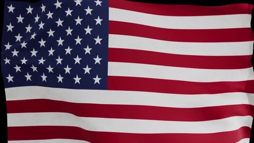 The flag of the United States of America slowly flutters in the wind against a transparent backgroun