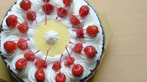 Fruit Topped Cake with Pineapple, Cherry, and Strawberries