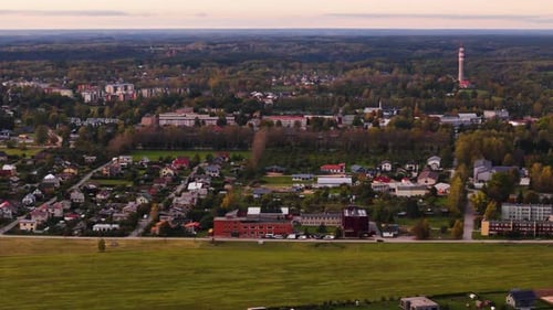 Aerial View of Autumn in Sigulda, Latvia, Golden Forests and Picturesque Town
