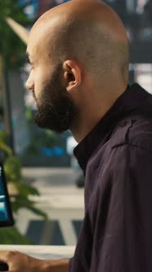 Vertical Video Accountant in Busy Workplace Talking with Colleagues While Working