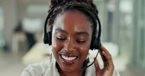 Smiling Woman Wearing Headset in Bright Office