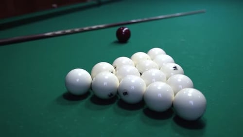 Billiard balls with numbers on a pool table