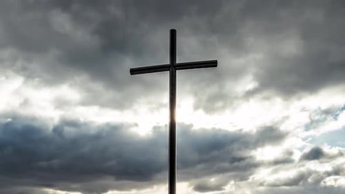 Cross Silhouette with Moody, Dramatic, Overcast Sky