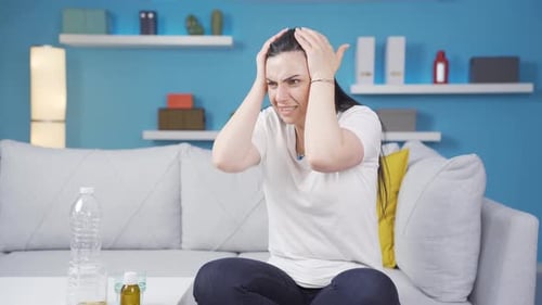 Adult Woman Experiencing Discomfort Indoors