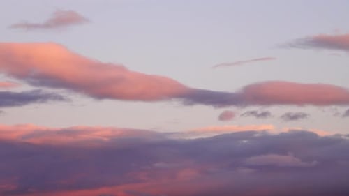 contrast of dark clouds over sunset sky