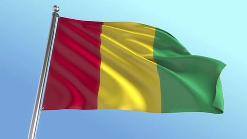 Realistic Guinea National Flag Waving in Blue Sky