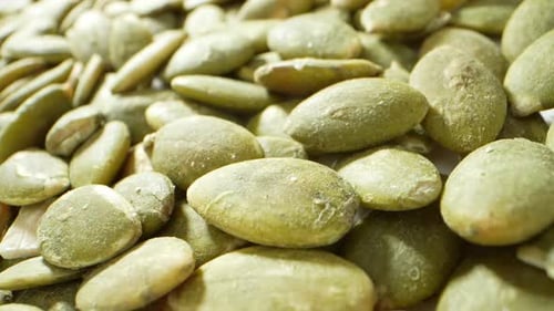 Vibrant green pumpkin kernels.