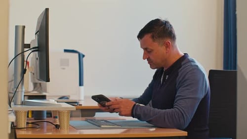 A man is working in the office