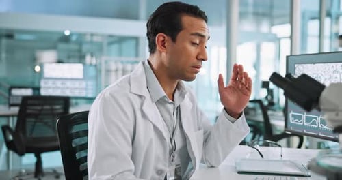 Man Working in a Modern Science Laboratory