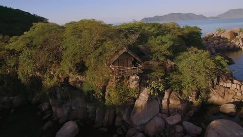 Aerial Drone Quadcopter of Luxury Water Front Hotel Resort on Island, Rustic