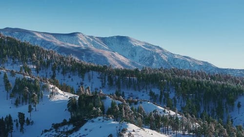 The Stunning Big Bear Mountains are Highlighted at Sunset with Snow