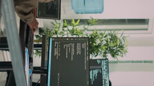 Team Coding in Modern Brightly Lit Office Setting