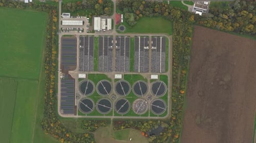 Aerial top down view of industrial sewage water treatment plant