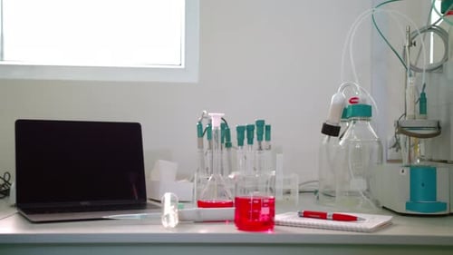 Science Lab Equipment Panning On. Automatic Titrator in Biotechnology Lab. Laboratory Glassware