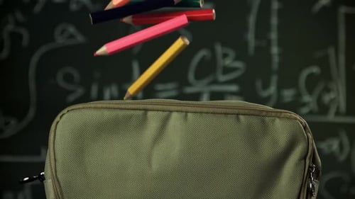 Multicolored Pencils Fall Into the School Pencil Case Filmed on a Highspeed Camera at 1000 Fps