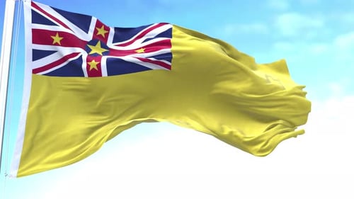 Niue National Flag Waving in Realistic Blue Sky Loop