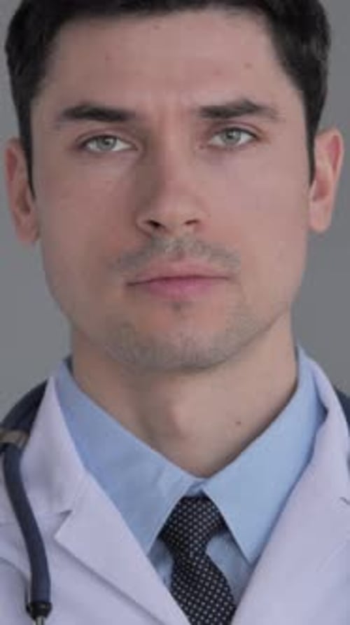 Portrait of Young Doctor in Clinic, Vertical Video
