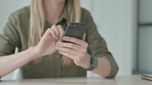 Blonde Woman Using Smartphone, Close Up