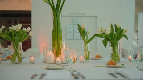 Luxury Restaurant Banquet White Table Set Up Served Dinner Tableware and Silverware on Event Move