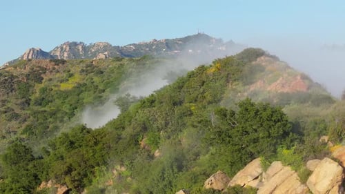 Sunrise Over Fogcovered Mountains in Malibu California Showcasing Beauty