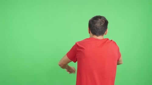 Rear View of a Man Waving a Chinese Pennant