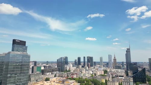 Modern City high rise skyscraper buildings. Aerial drone view of the Financial District Warsaw Dayti