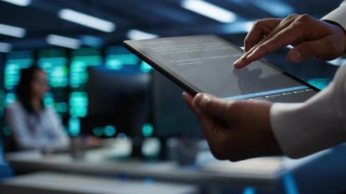 Programmer Using Device in Data Center Close Up
