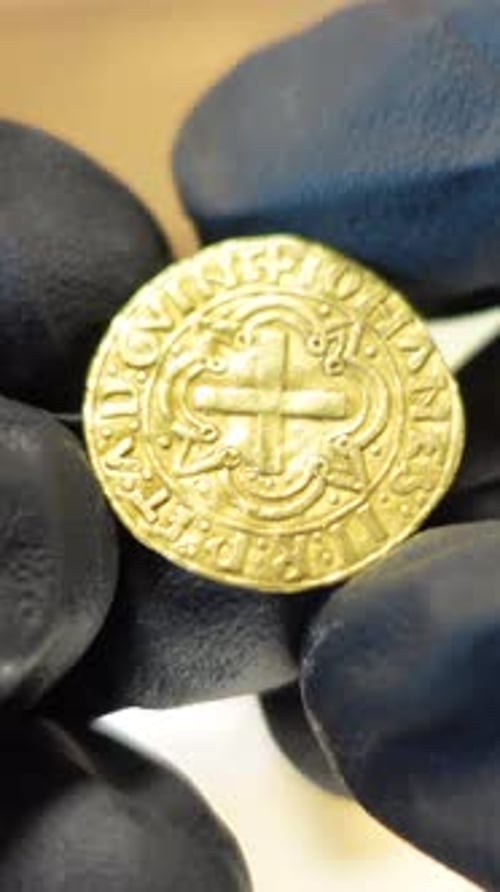 Vertical Video of Historic Portuguese Coin