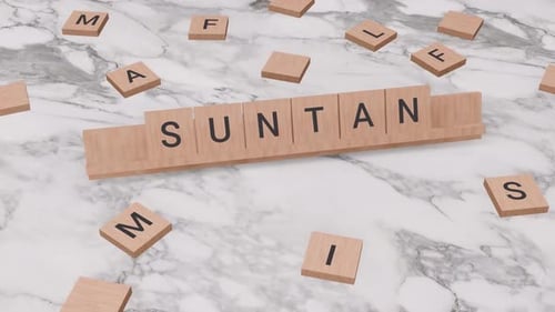 Wooden Letter Tiles Spell Suntan Title Reveal