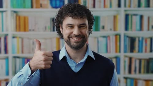 A Man Explores Literature Versus Opinion in a Cozy Library