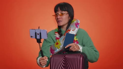 Traveler Blogger Woman in Sunglasses with Luggage Taking Selfie on Smartphone Record Make Video Call