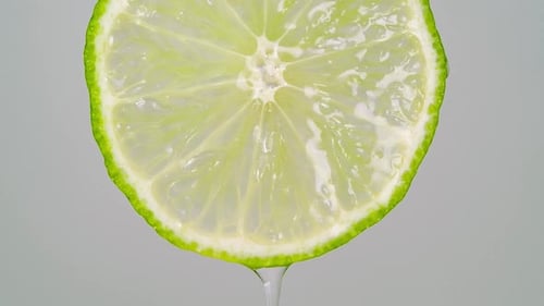 Lime Slice Close-Up with Water Droplets