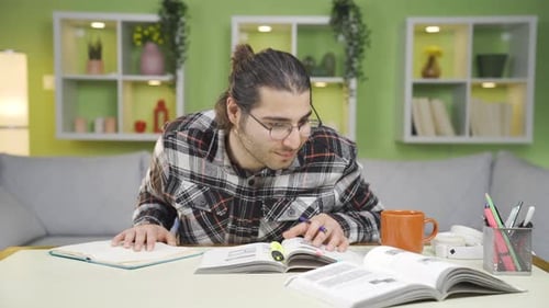 University student young man happily studying.